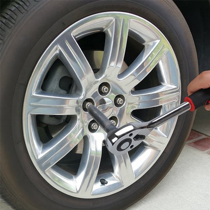 Clé à cliquet​ déssere un ecrou d'une  roue