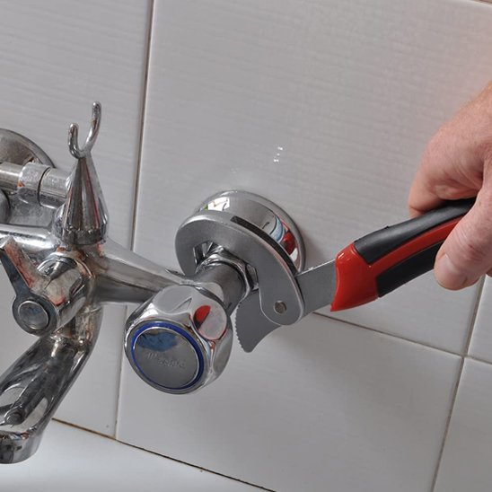 Clé à griffe ajuste un métigeur